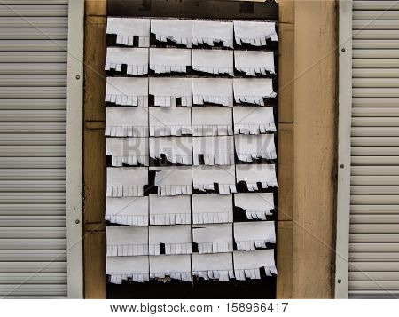 Advertisement template of the Bulletin board on the wall. The dream of the perfectionist - all Tear off paper notice a very orderly