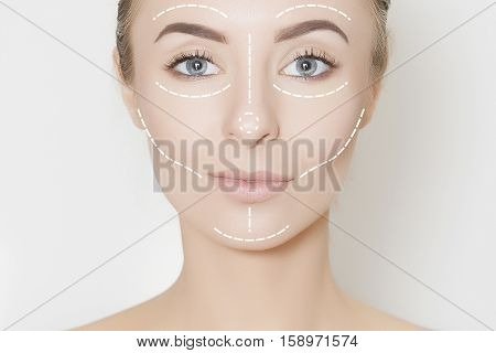 Closeup of female adult with marks on skin for cosmetic medical procedures
