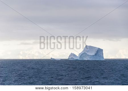 Antarctica in a cloudy day- Antarctic Peninsula - Palmer Archipelago - Neumayer Channel - Global warming - Fairytale landscape