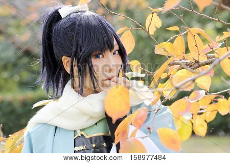 Marugame, Kagawa, Japan -  November 20, 2016: Young japanese girl dressed in cosplay costume at Mamugame-Jou Park. Photo taken in Marugame Cosplay Convention