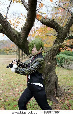 Marugame, Kagawa, Japan -  November 20, 2016: Young japanese girl dressed in cosplay costume at Mamugame-Jou Park. Photo taken in Marugame Cosplay Convention