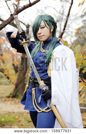 Marugame, Kagawa, Japan -  November 20, 2016: Young japanese girl dressed in cosplay costume at Mamugame-Jou Park. Photo taken in Marugame Cosplay Convention