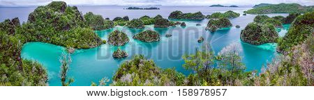 Painemo Island, Blue Lagoon, Raja Ampat, West Papua Indonesia, banner.