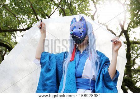 Marugame, Kagawa, Japan -  November 20, 2016: Young japanese girl dressed in cosplay costume at Mamugame-Jou Park. Photo taken in Marugame Cosplay Convention