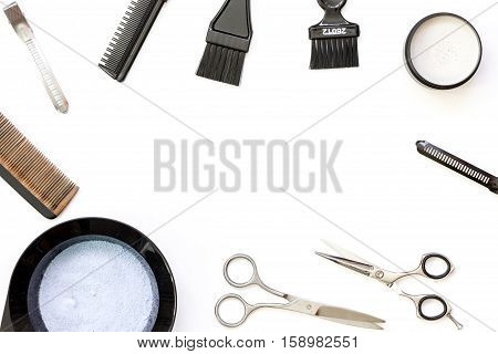 Tools for hair dye and hairdye top view on white background
