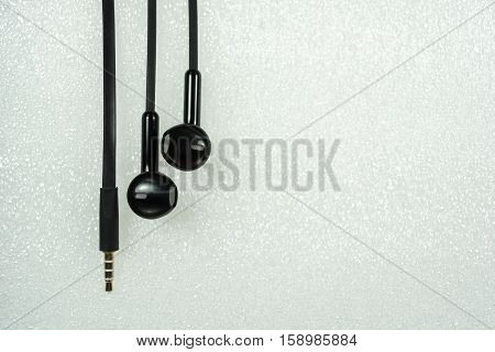 Black Earphone or earphones on white background the Black earphones for using digital music or smart phone