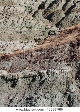Layers of unique geology in John Day Fossil Beds on a sunny fall morning.