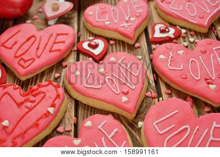 Festive cookies decorated with pink sugar mastic