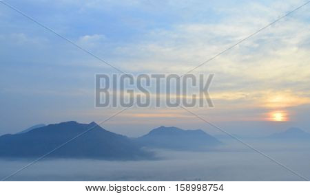 Mountain In Fog During Sunrise - Cloudy View