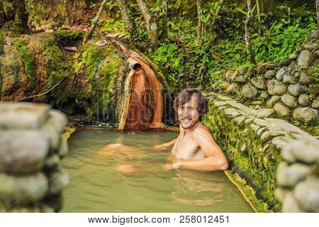 Man Tourist In Belulang Hot Springs In Bali, Village Mengesta, Penebel District, Tabanan Regency