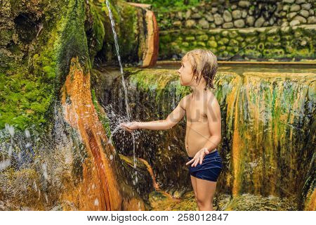 Boy Tourist In Belulang Hot Springs In Bali, Village Mengesta, Penebel District, Tabanan Regency Tra