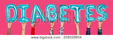 Hands showing diabates balloons word