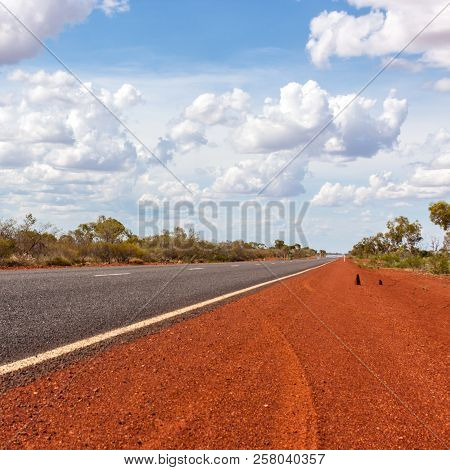 Empty Asphalt Road Through Australian Outback. Central Australia