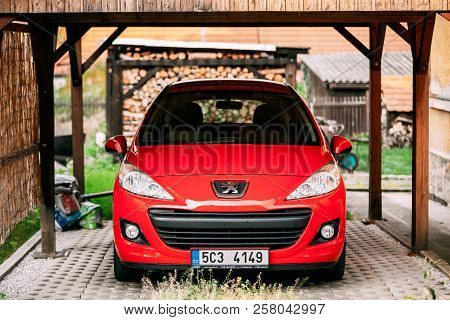 Cesky Krumlov, Czech Republic - September 26, 2017: Red Peugeot 207 Car Parked In Yard. Peugeot 207 
