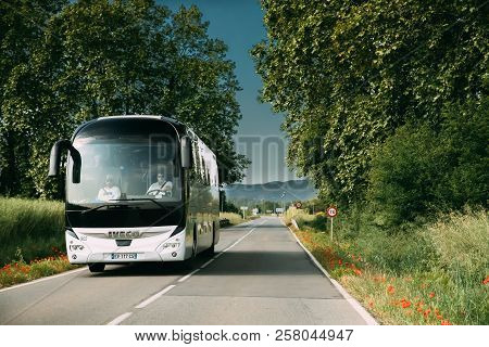 Serra De Daro, Catalonia, Spain - May 17, 2018: Iveco Bus In Motion On Spanish Country Road.