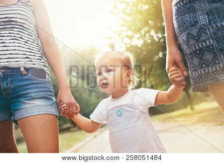 Little 2years Old Girl Walks With Her Family