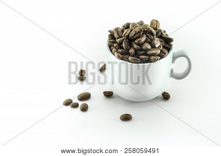 Coffee Bean - Small Cup Full Of Coffee Bean Isolated On White.