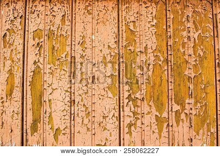 Whethered Grungy Brown Wood Planks Background. Pealing Old Cracked Paint Wood Backdrop.
