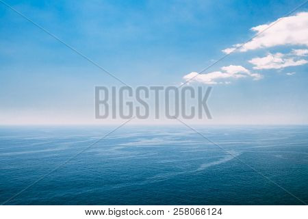 Riple Sea Ocean And Blue Sky Background.
