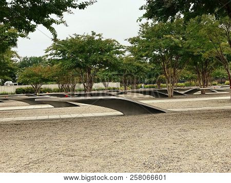 Arlington, Virginia, Usa - September 11 2018: Benches Serve As An Outdoor Memorial For The 184 Peopl