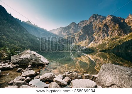 Tatra National Park, Poland. Famous Mountains Lake Morskie Oko Or Sea Eye Lake In Summer Morning. Fi
