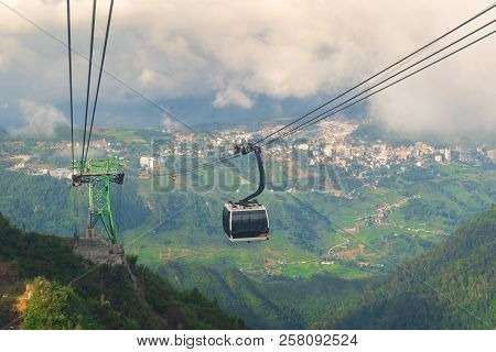 Cable Car In The Middle Of The Valley, Fog In Cloud Background Of Country In Fansipan Mountain Sapa 
