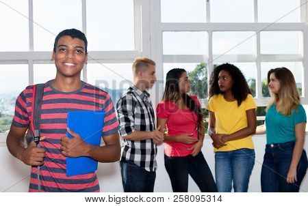 Laughing Student From India With International Students At University