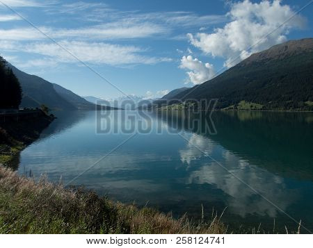 Lago Resia In Italy Wit Ortler Mountain