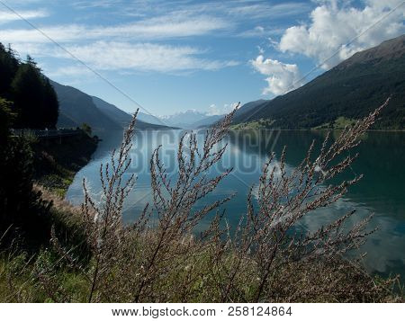 Lago Resia In Italy Wit Ortler Mountain