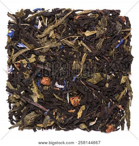 Mix Of Black Tea With Green Sencha Tea And Cornflower Flowers And Strawberry Slices On White Backgro