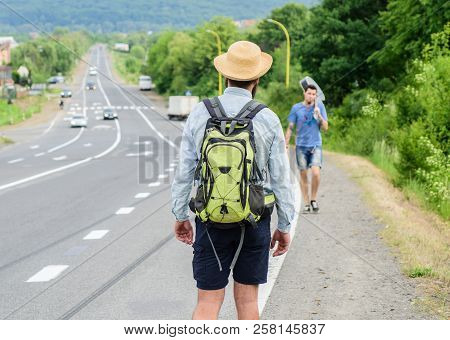 Meet Fellow Traveler. Man Traveler Hitchhiker Meet Companion At Road Edge. Friends Or Companions Tra
