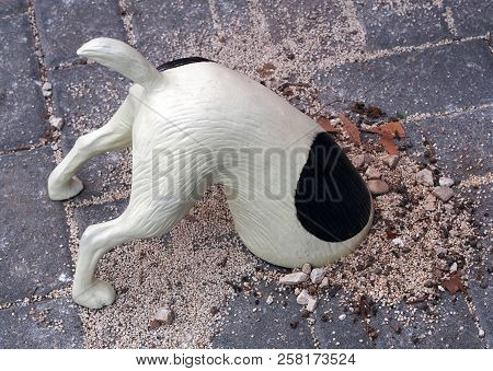 Funny Figurine Of Digging Litlle Dog. Spain.