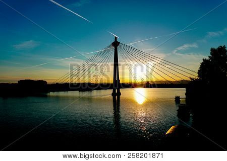 Beautiful Sunset With Donaustadt Bridge In Vienna, Austria.