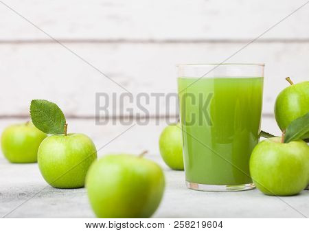 Glass Of Fresh Organic Apple Juice With Granny Smith And British Bramley Apples In Box On Wooden Bac