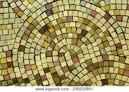 Golden smalt on the mosaic panel outside the Kronstadt Naval Cathedral in Kronstadt near Saint Petersburg, Russia.