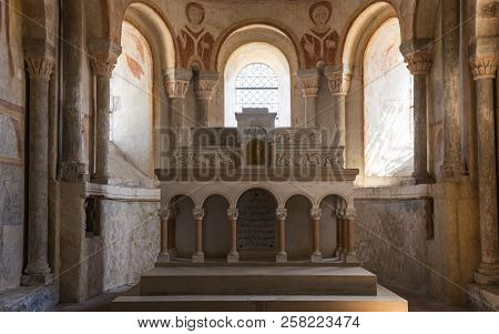 Gourdon, France - August 3, 2018: Interior With Pink Color, Altar And Frescoes Of The Romanesque Chu