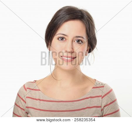 Close-up Portrait Of Nice Young Woman Wearing In Striped Blouse