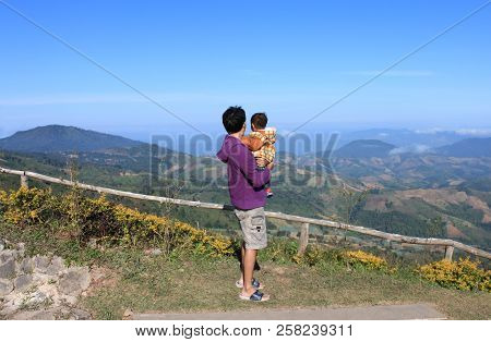 Farther And Son At Khun Sathan National Park Mountain Thailand In The Winter.