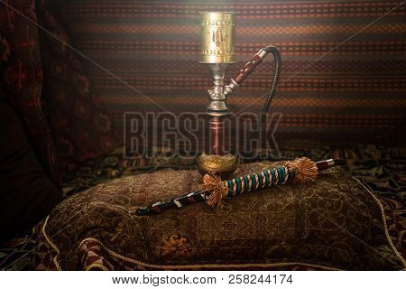 Hookah Hot Coals On Shisha Bowl Making Clouds Of Steam At Arabian Interior. Oriental Ornament On The