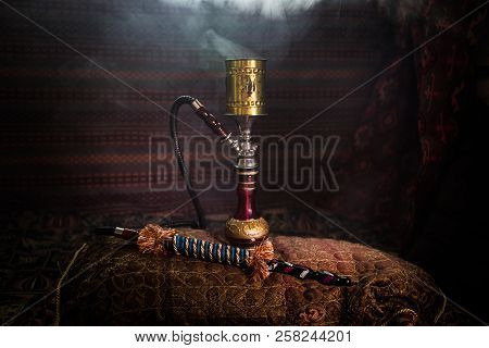 Hookah Hot Coals On Shisha Bowl Making Clouds Of Steam At Arabian Interior. Oriental Ornament On The