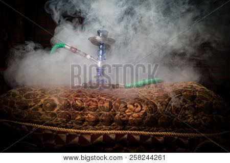 Hookah Hot Coals On Shisha Bowl Making Clouds Of Steam At Arabian Interior. Oriental Ornament On The