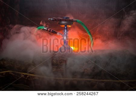 Hookah Hot Coals On Shisha Bowl Making Clouds Of Steam At Arabian Interior. Oriental Ornament On The