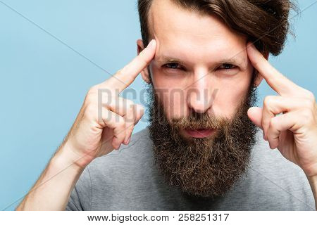 Mind Games And Brain Power. Mentalist And Cognitive Skills Concept. Man Concentrating And Holding In