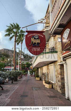 MARIGOT, ST.MARTIN - JULY 31, 2015: Walkway with store sign in  Marigot in Caribbean Island St.Marten.