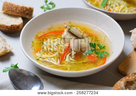 Quail Noodle Soup, Homemade Broth With Noodles And Vegetables Served With Bread Rolls, Zama, Traditi