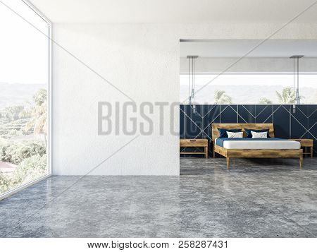 Blue Geometric Wall Pattern Bedroom Interior With A Concrete Floor, A Panoramic Window And Blue Blan