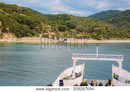 Holy Mountain, Greece - September 23, 2014: Pilgrims Take A Ferry To The Holy Mountain Athos