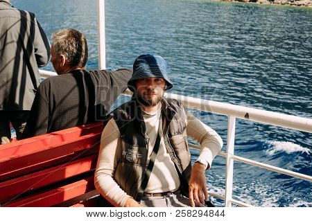 Ouranoupoli, Greece - September 23, 2014: Pilgrims Take A Ferry To The Holy Mountain Athos