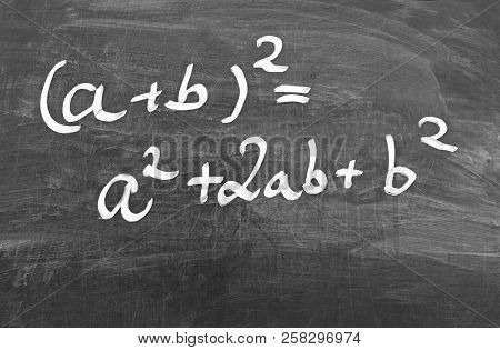First Binomial Formula, Written With White Chalk On A Blackborad