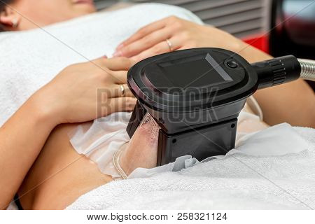 Woman Getting Cryolipolysis Fat Treatment Procedure In Professional Cosmetic Cabinet Or Spa Center